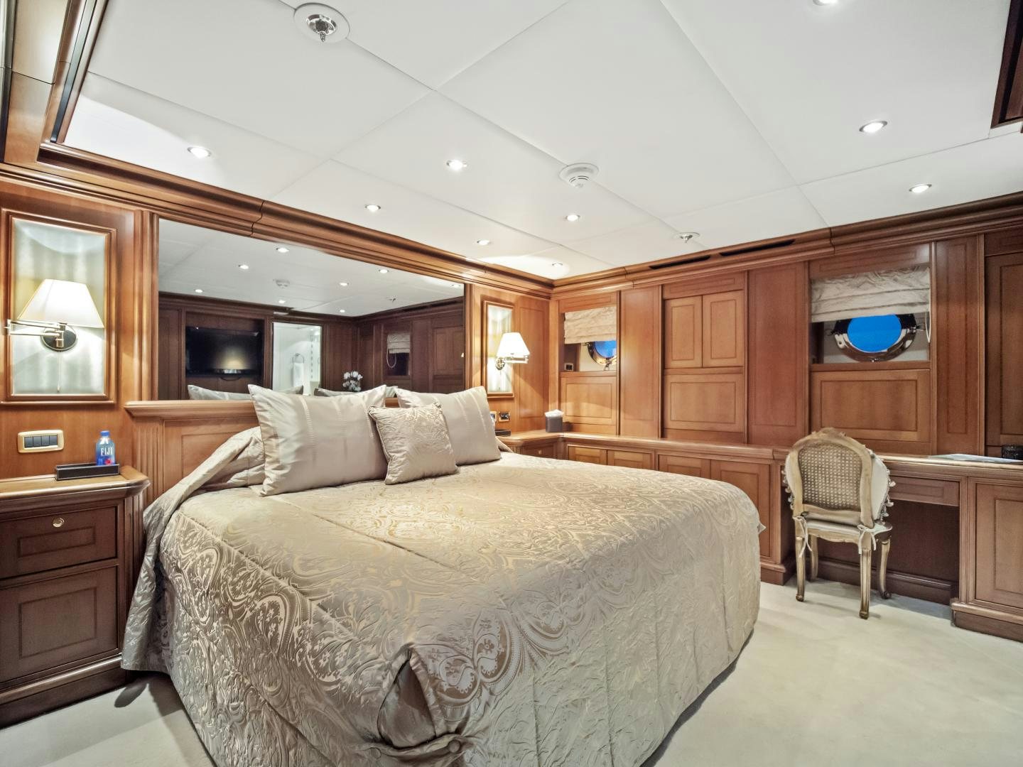 a large bed in a room aboard THE LANGLEY Yacht for Sale