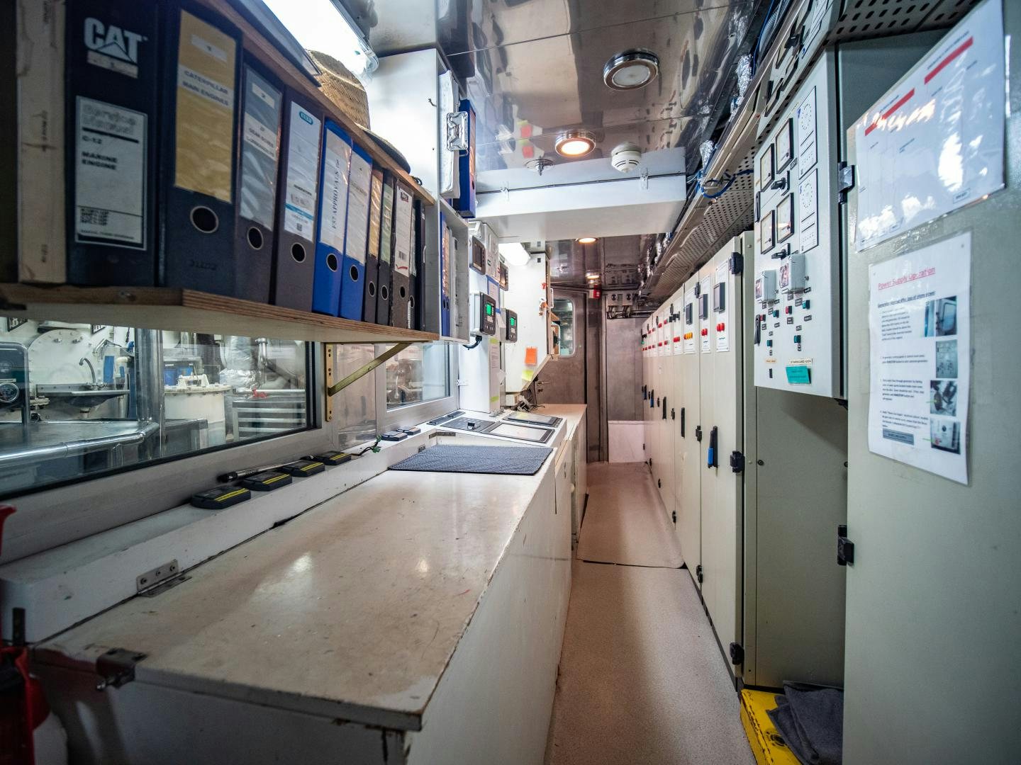 a row of machines in a room aboard THE LANGLEY Yacht for Sale