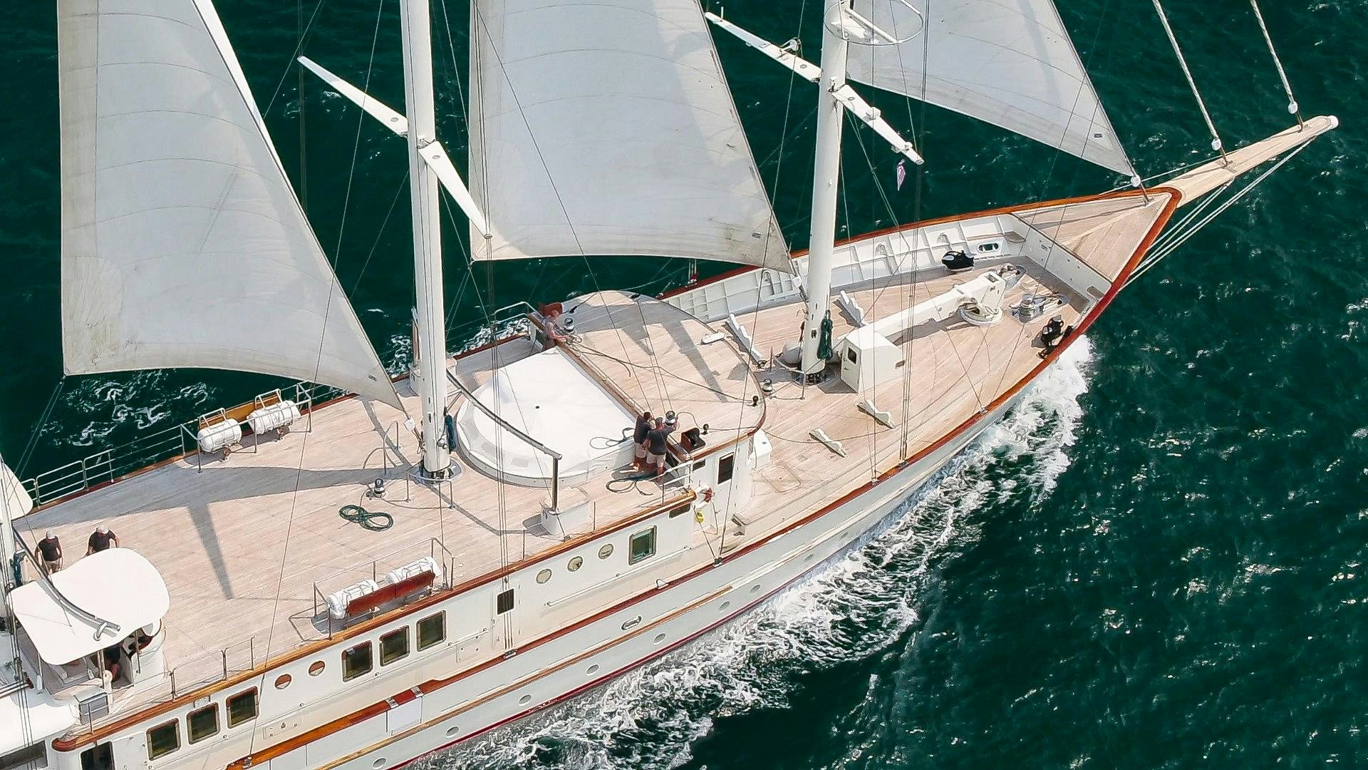 a large white boat in the water aboard THE LANGLEY Yacht for Sale