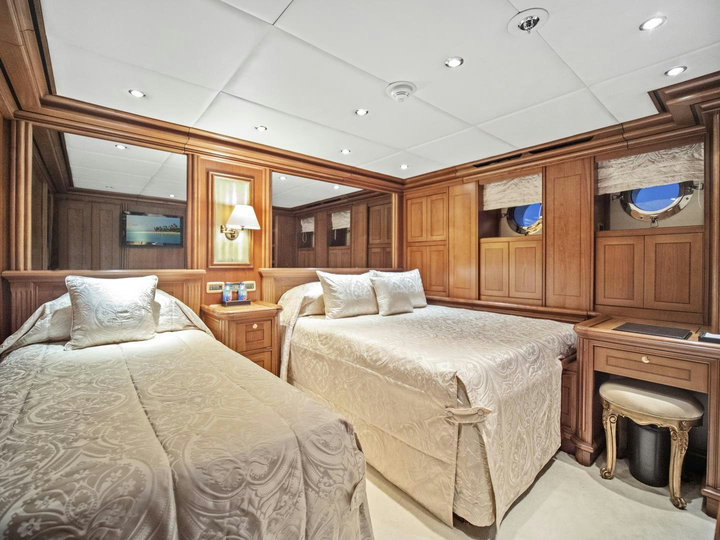 a couple of beds in a room aboard THE LANGLEY Yacht for Sale