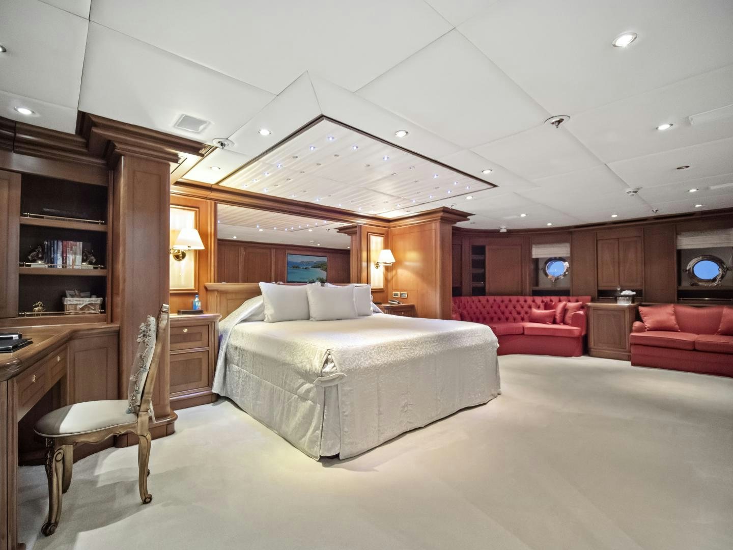 a large bedroom with a large bed aboard THE LANGLEY Yacht for Sale