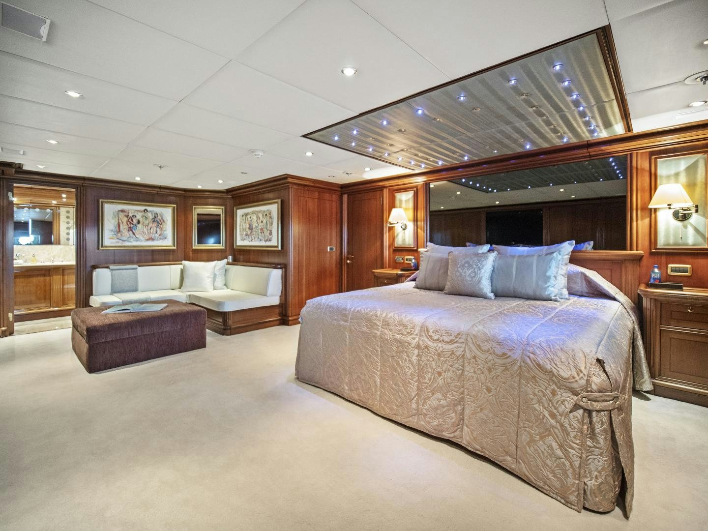 a large bedroom with a large bed aboard THE LANGLEY Yacht for Sale