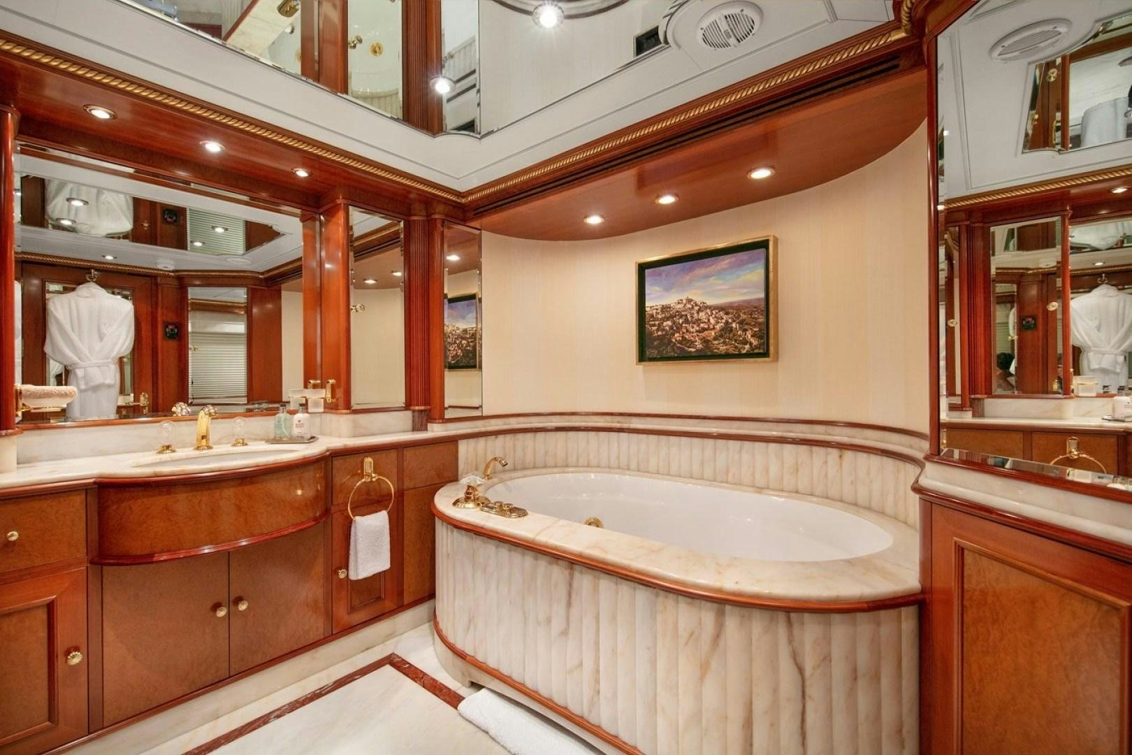a large bathroom with a large jacuzzi tub aboard NEXT CHAPTER Yacht for Sale