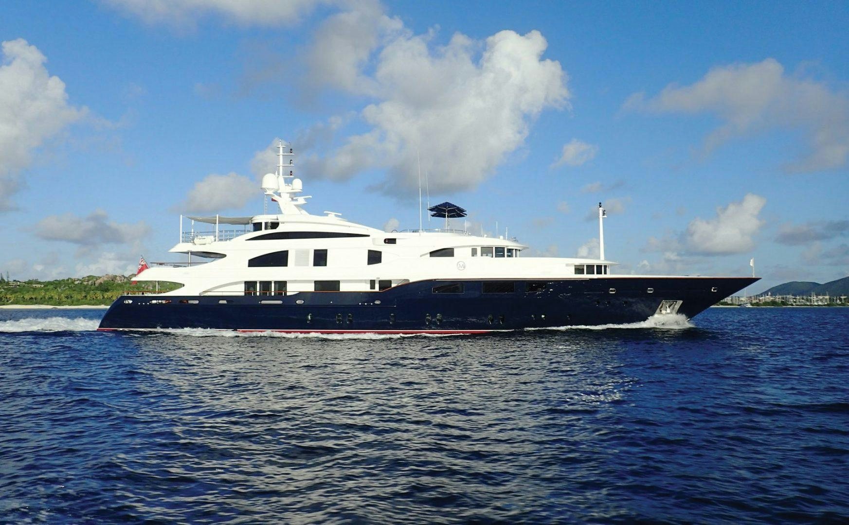a large boat on the water aboard NEXT CHAPTER Yacht for Sale