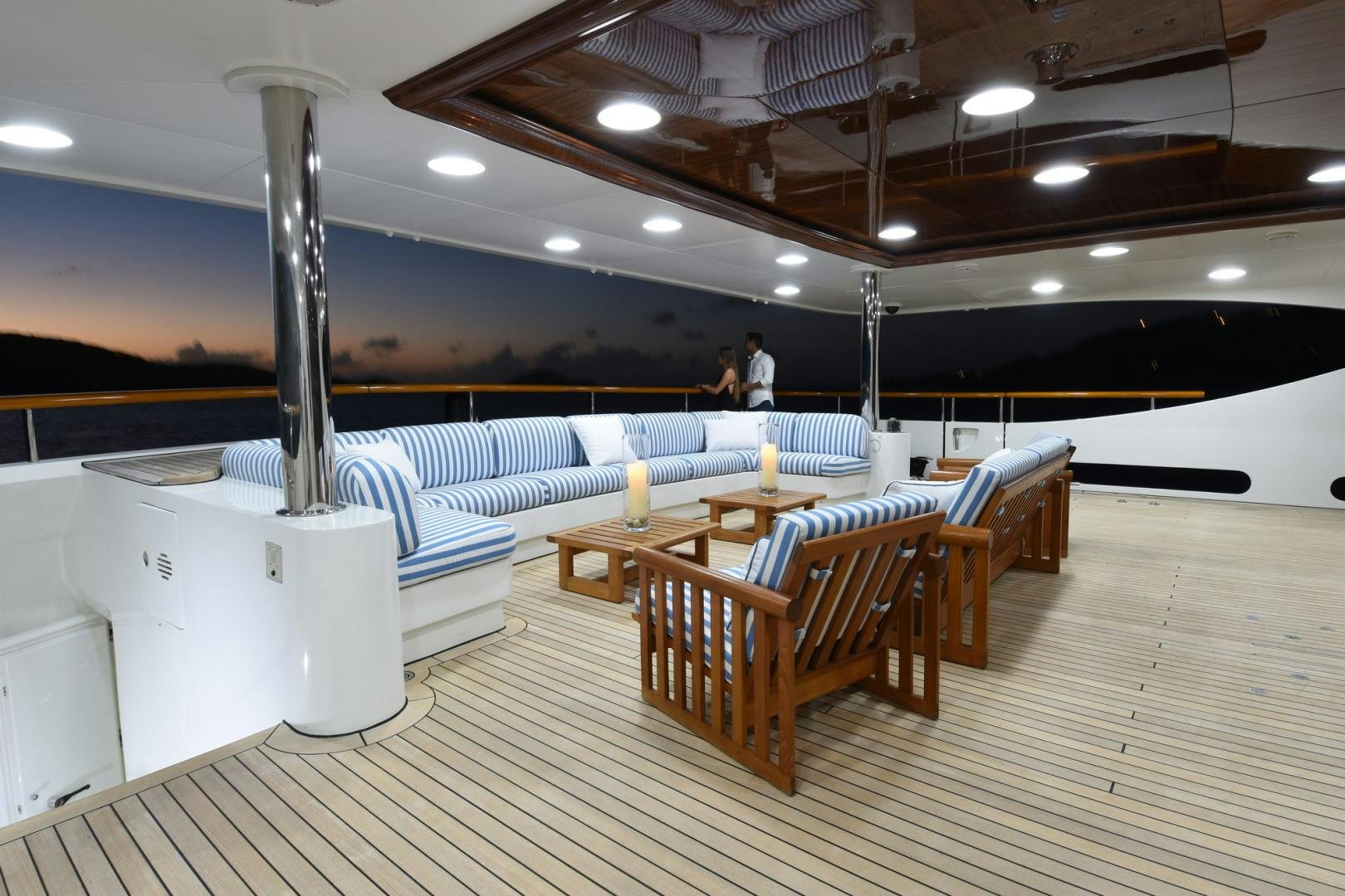 a large room with tables and chairs aboard NEXT CHAPTER Yacht for Sale