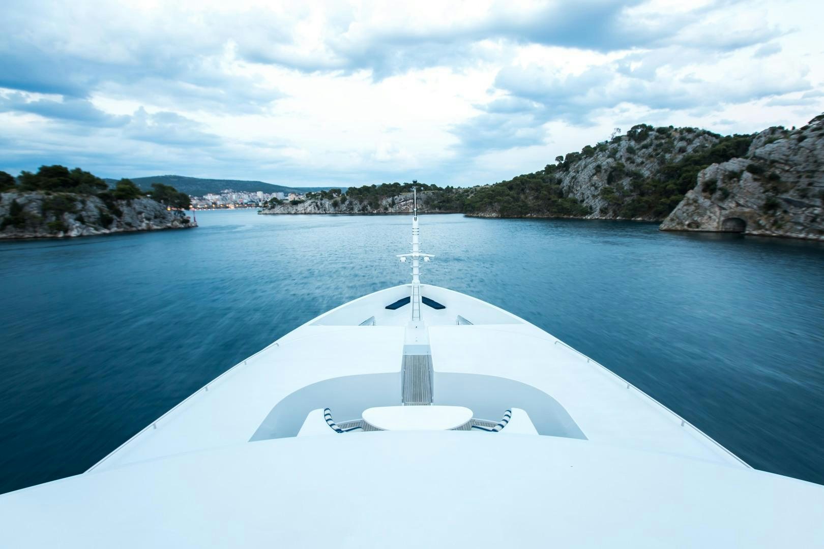 a boat on the water aboard MUSTIQUE Yacht for Sale