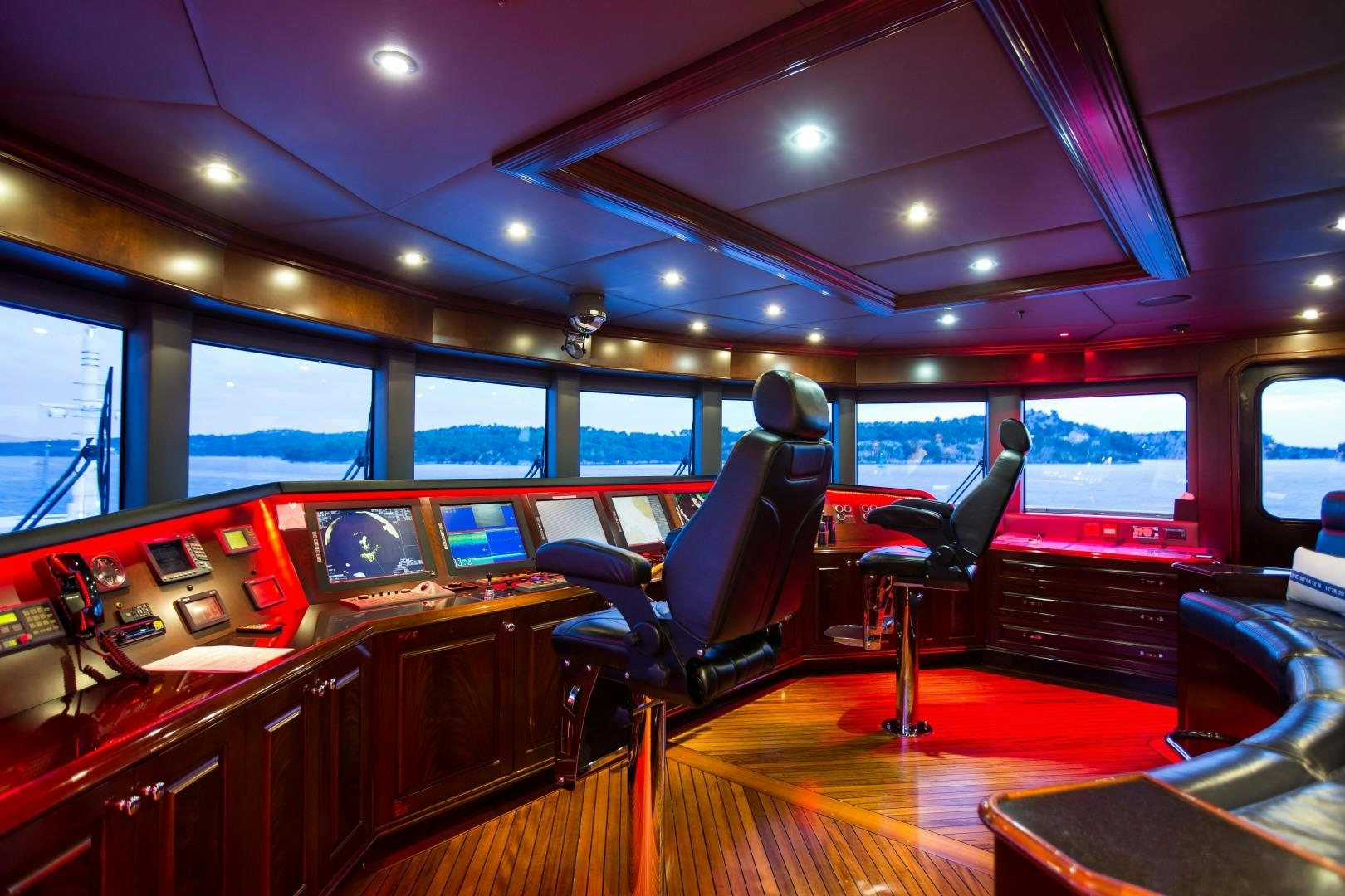inside of a vehicle with a large screen and a large window aboard MUSTIQUE Yacht for Sale