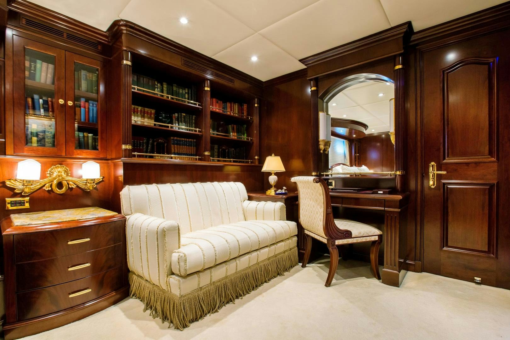 a large room with a bed and a piano aboard MUSTIQUE Yacht for Sale