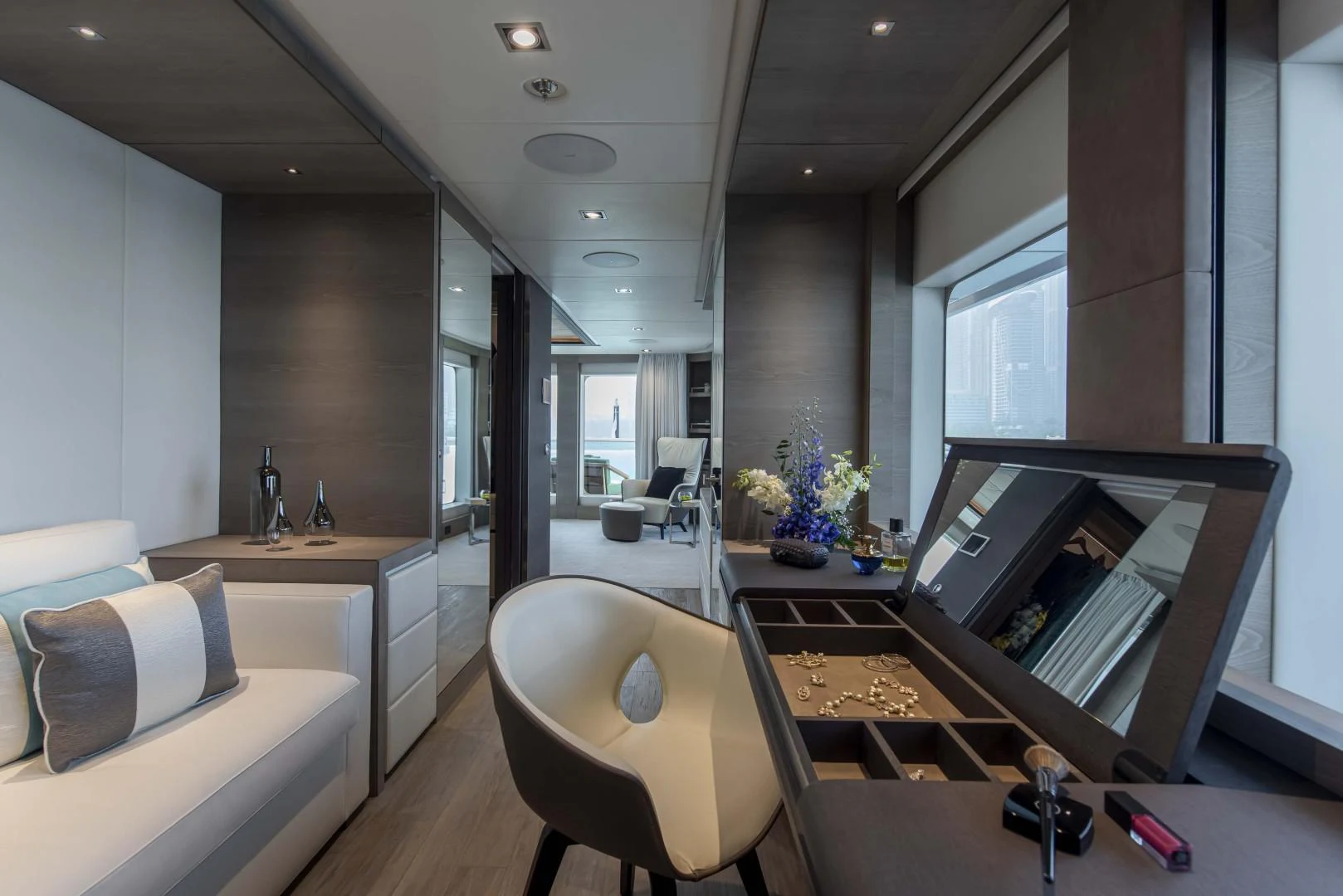 a modern looking room with a large desk and a large window aboard MAJESTY 175 Yacht for Sale