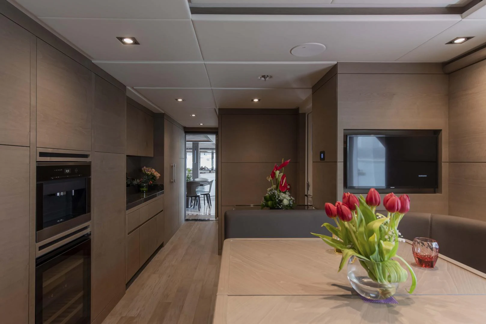 a modern kitchen with a large island aboard MAJESTY 175 Yacht for Sale