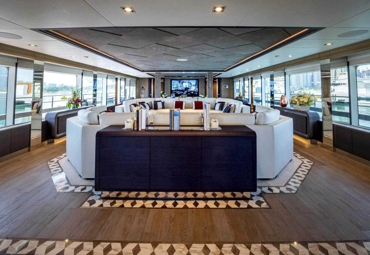 a room with a table and chairs aboard MAJESTY 175 Yacht for Sale