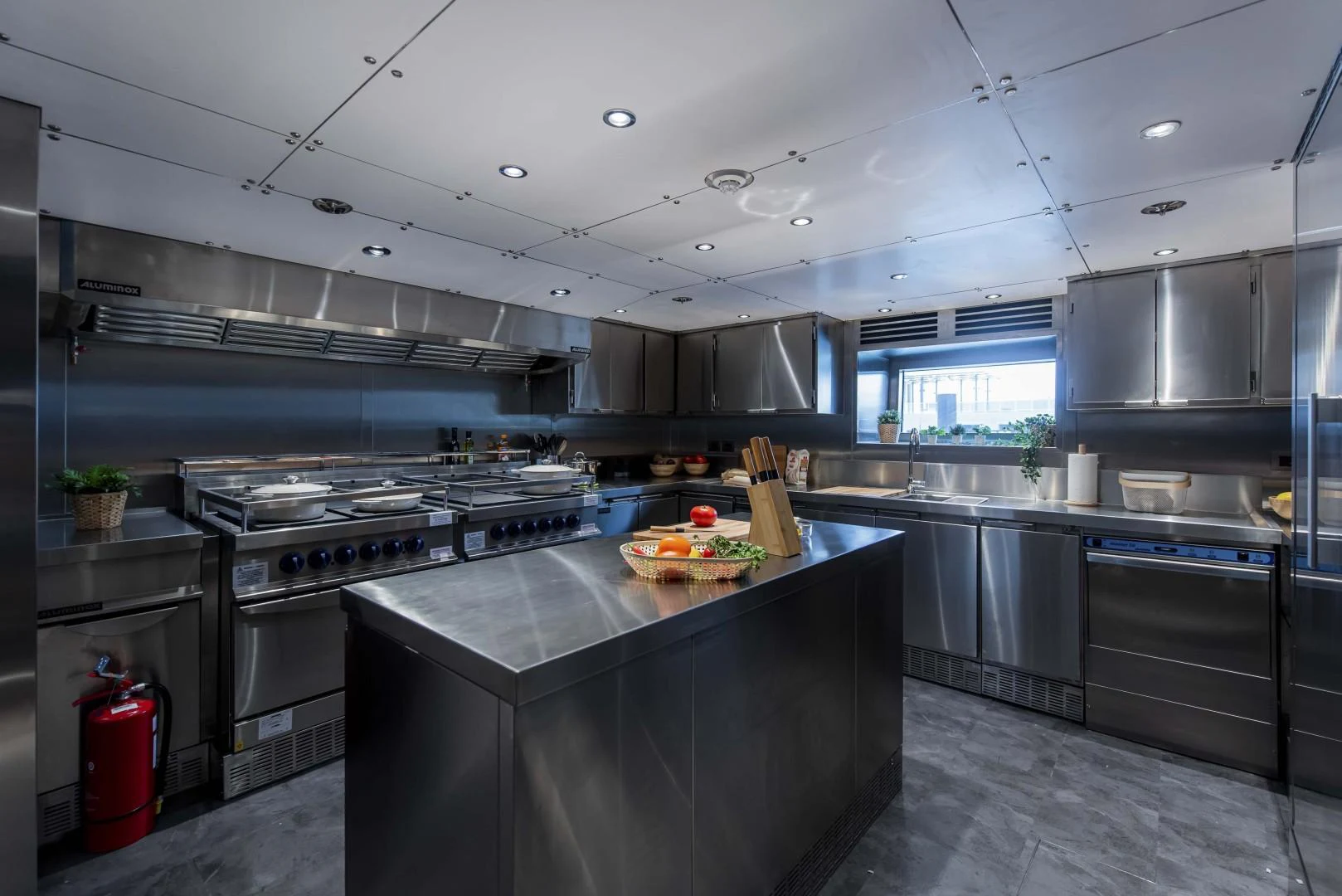a large kitchen with stainless steel appliances aboard MAJESTY 175 Yacht for Sale