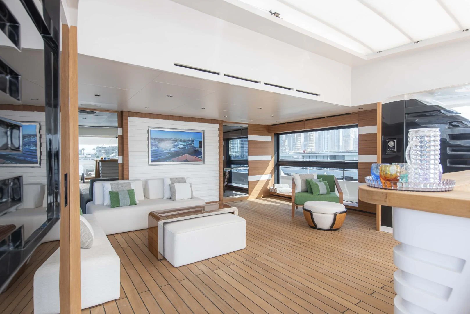 a room with a couch and a table aboard MAJESTY 175 Yacht for Sale
