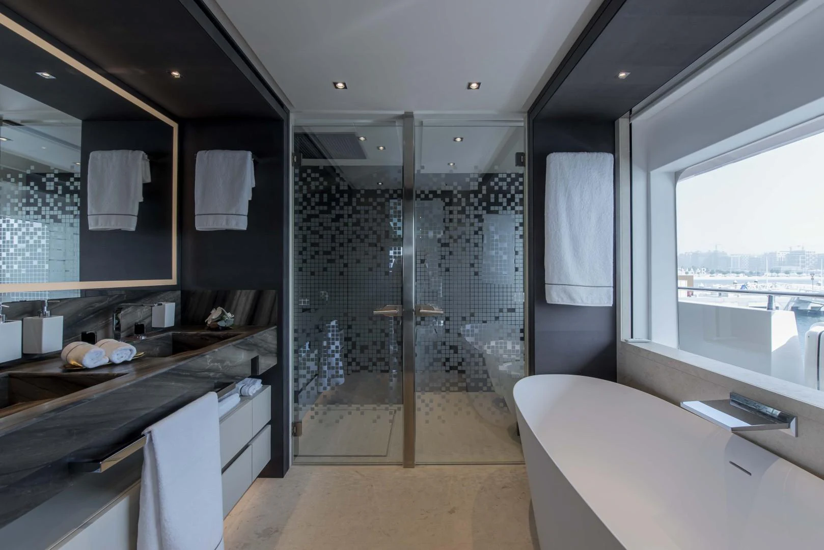 a bathroom with a glass shower aboard MAJESTY 175 Yacht for Sale