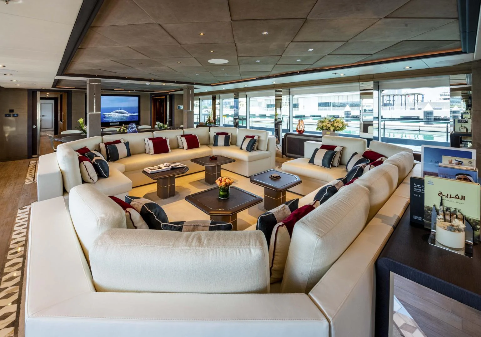 a living room with a large window aboard MAJESTY 175 Yacht for Sale