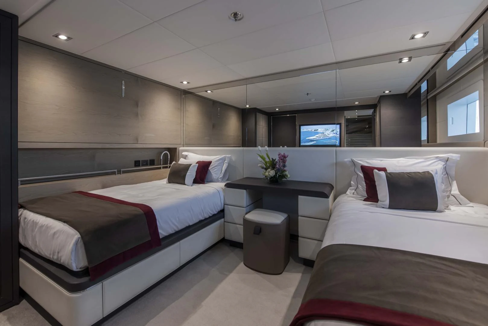 a room with beds and a tv aboard MAJESTY 175 Yacht for Sale