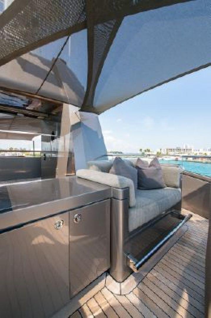 a room with a bed and a window aboard 174 OCEANFAST MIZU Yacht for Sale