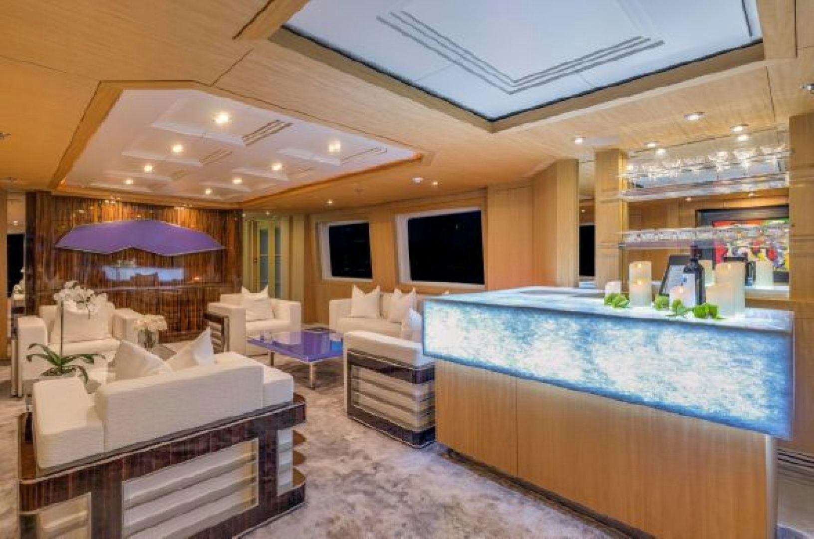 a large living room with a large jacuzzi aboard 174 OCEANFAST MIZU Yacht for Sale