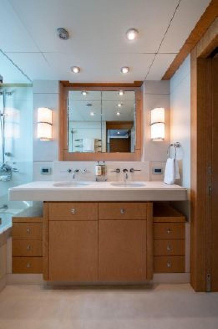 a bathroom with a sink and cabinets aboard 174 OCEANFAST MIZU Yacht for Sale