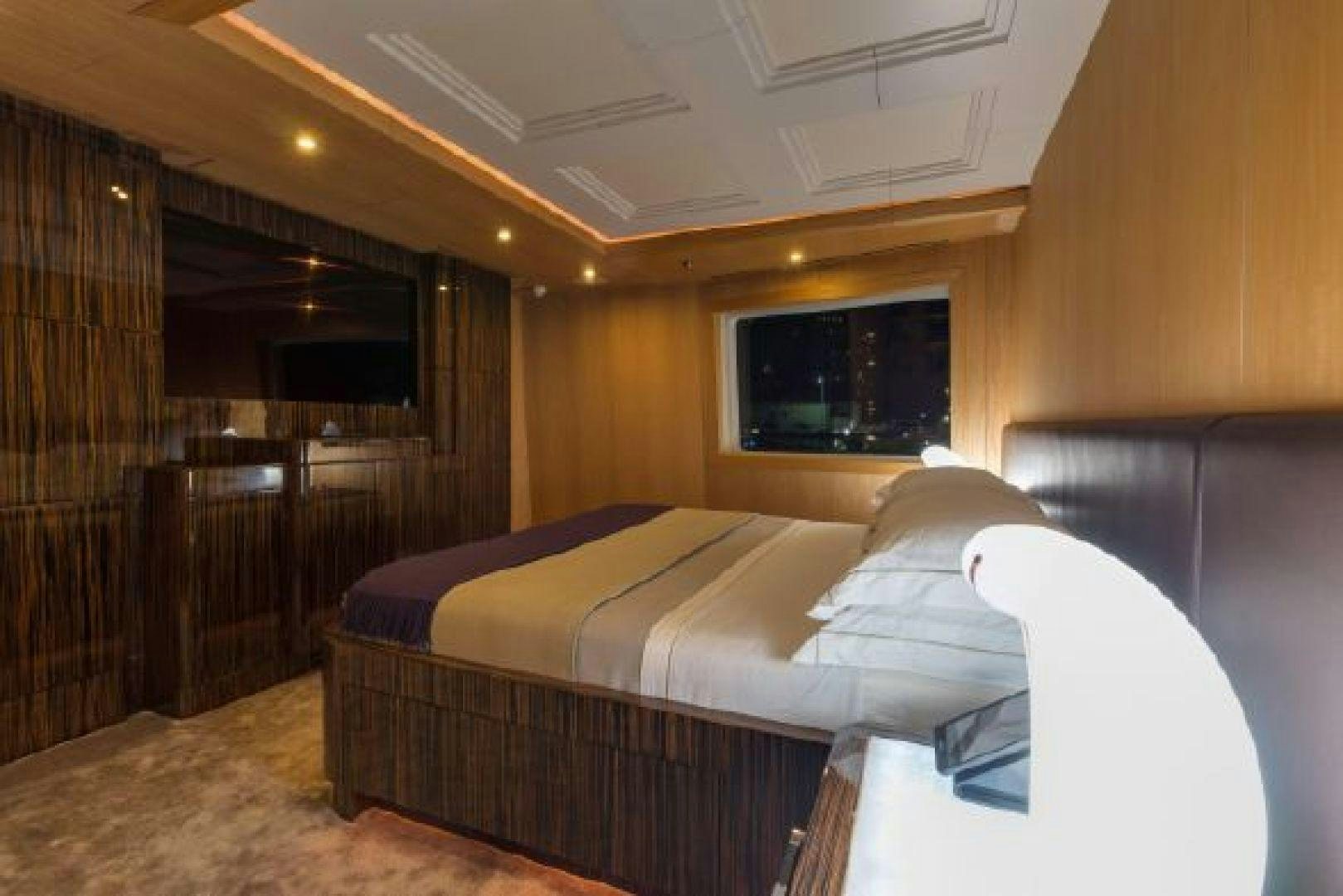 a bed in a room aboard 174 OCEANFAST MIZU Yacht for Sale