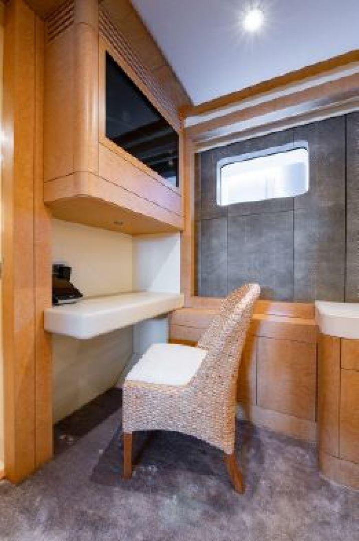 a chair and a sink in a room aboard 174 OCEANFAST MIZU Yacht for Sale