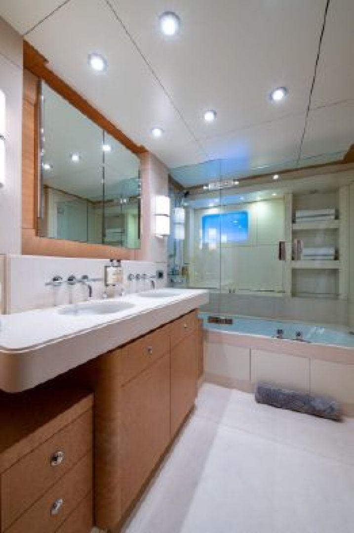 a bathroom with a large mirror aboard 174 OCEANFAST MIZU Yacht for Sale