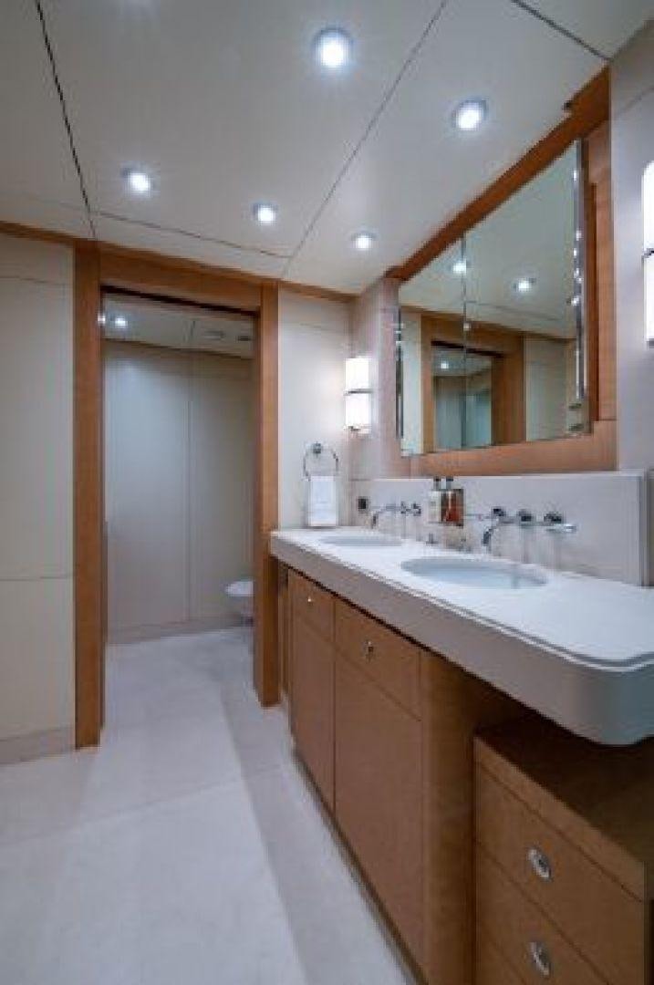 a bathroom with a large mirror aboard 174 OCEANFAST MIZU Yacht for Sale
