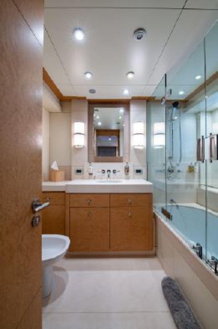 a bathroom with a shower and sink aboard 174 OCEANFAST MIZU Yacht for Sale
