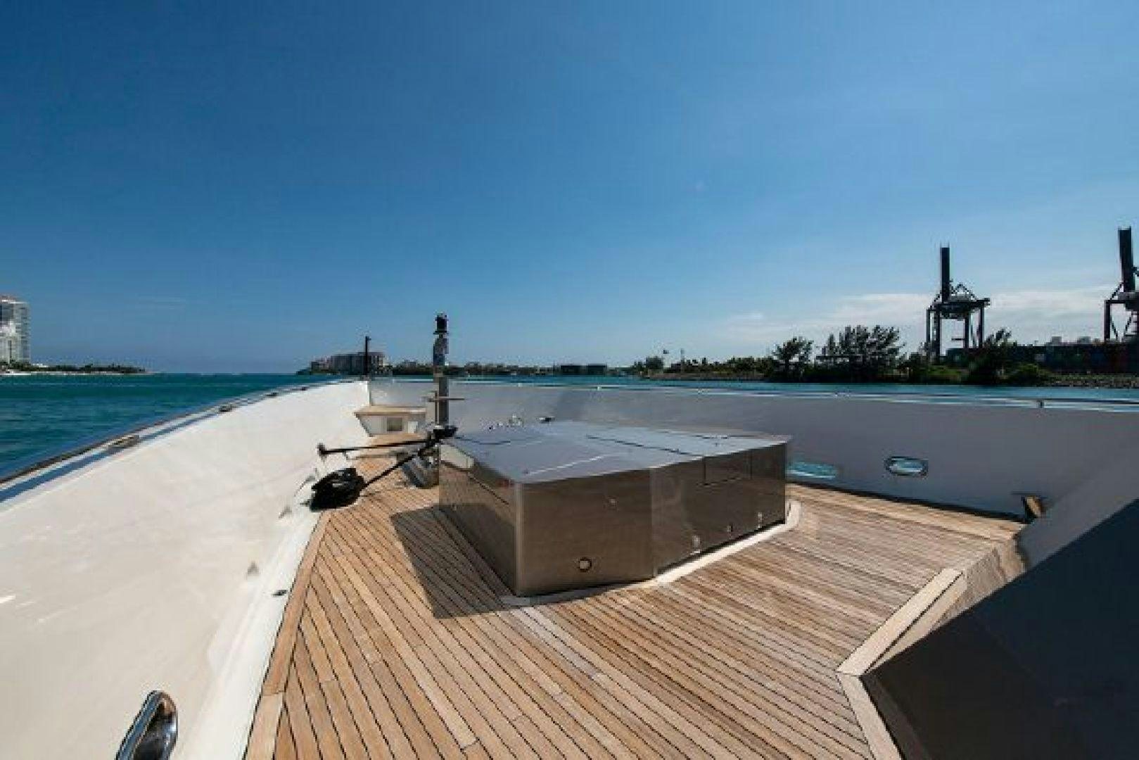 a deck with a pool and a view of the water aboard 174 OCEANFAST MIZU Yacht for Sale