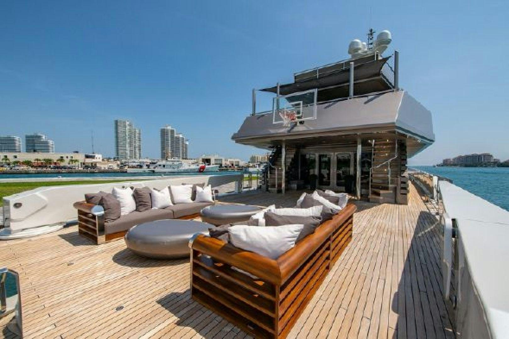a deck with a view of a city and a large body of water aboard 174 OCEANFAST MIZU Yacht for Sale