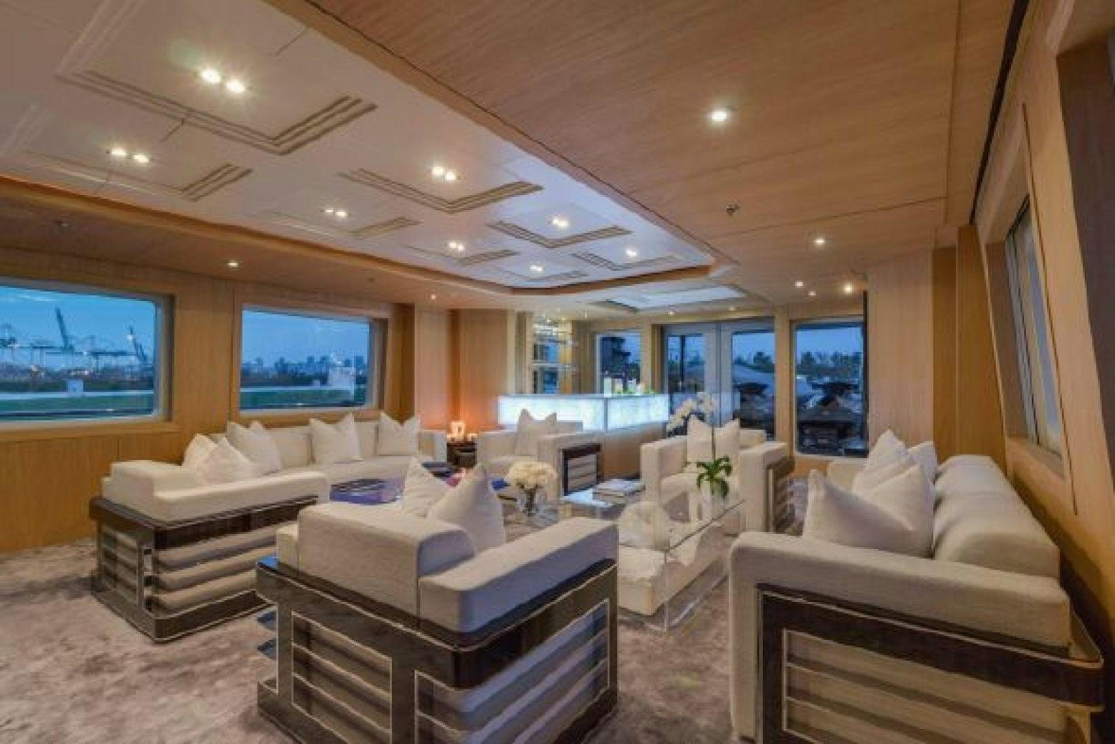 a living room with a large screen aboard 174 OCEANFAST MIZU Yacht for Sale