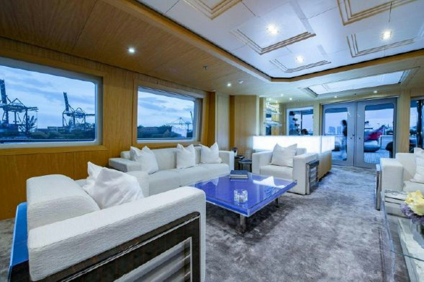 a living room with a large window aboard 174 OCEANFAST MIZU Yacht for Sale