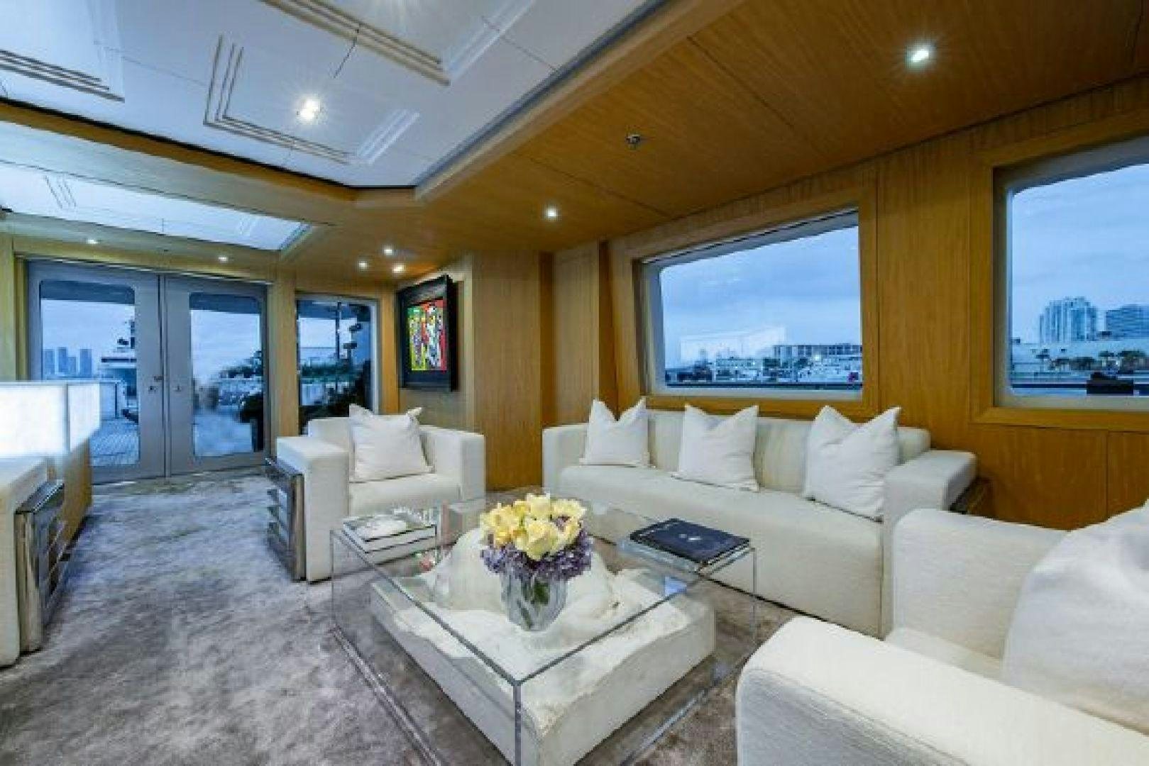 a living room with a large window aboard 174 OCEANFAST MIZU Yacht for Sale