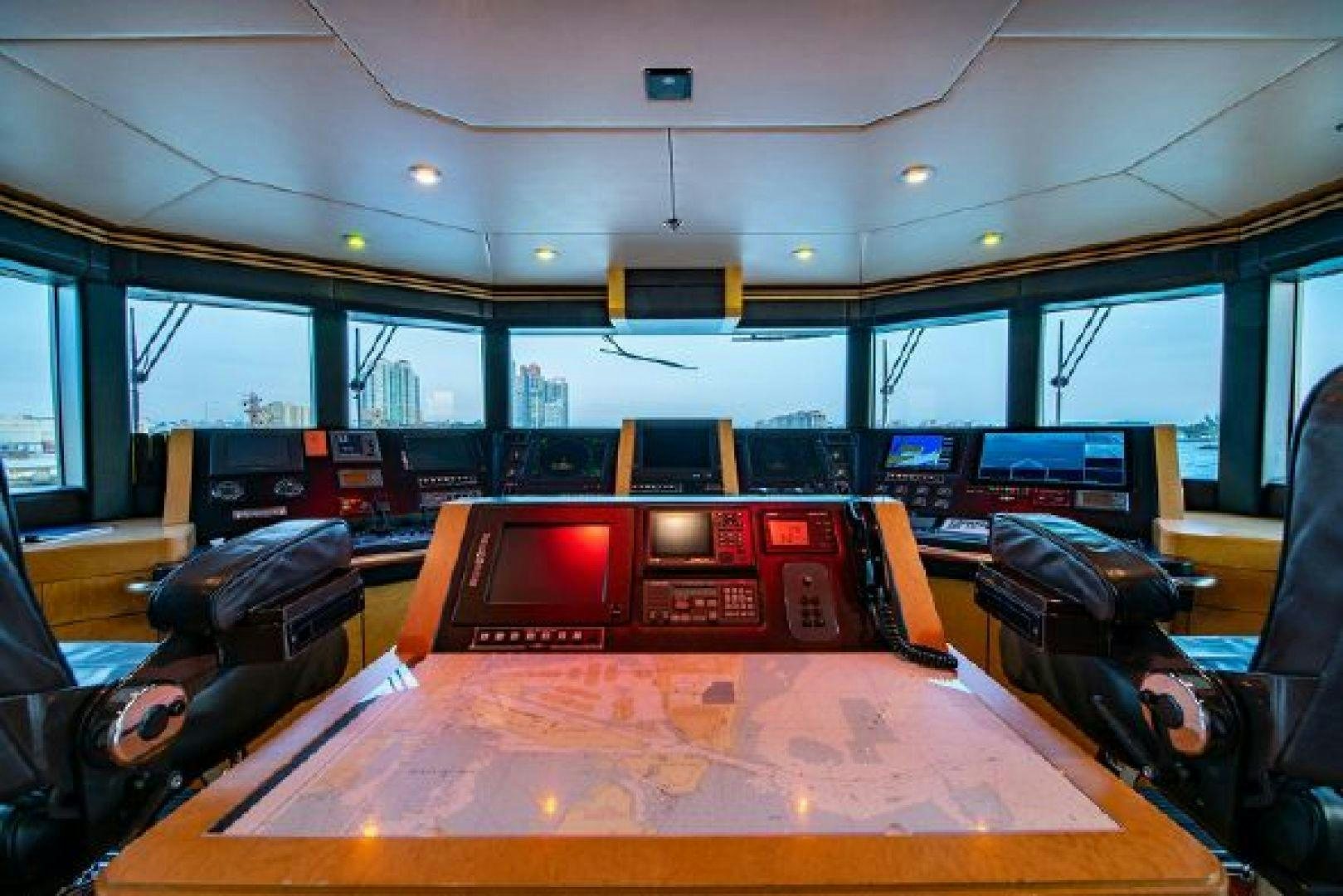 inside of a vehicle with a table and chairs and a large window aboard 174 OCEANFAST MIZU Yacht for Sale