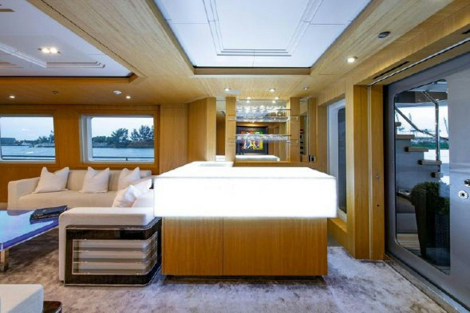 a room with a couch and a table aboard 174 OCEANFAST MIZU Yacht for Sale