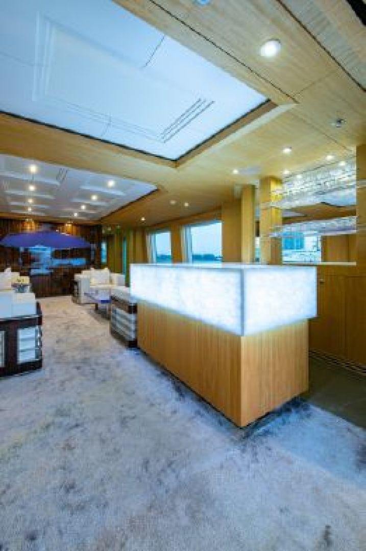 a room with a table and chairs aboard 174 OCEANFAST MIZU Yacht for Sale