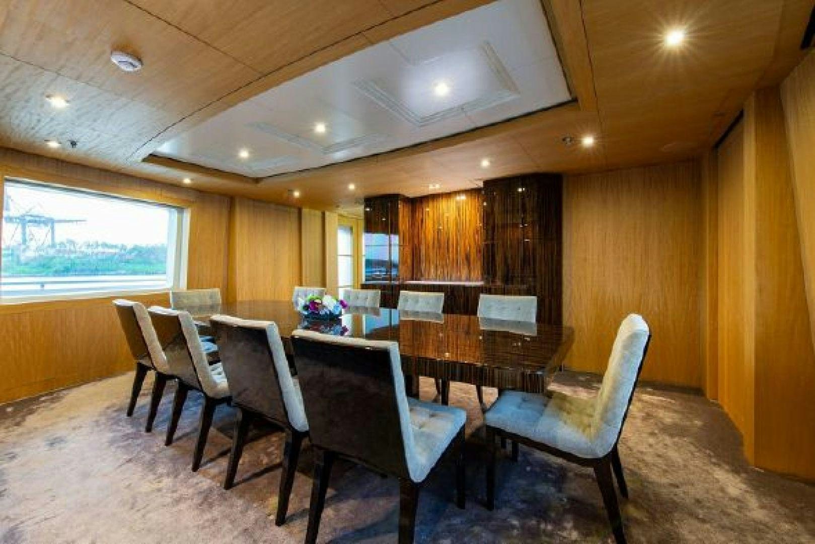 a conference room with tables and chairs aboard 174 OCEANFAST MIZU Yacht for Sale