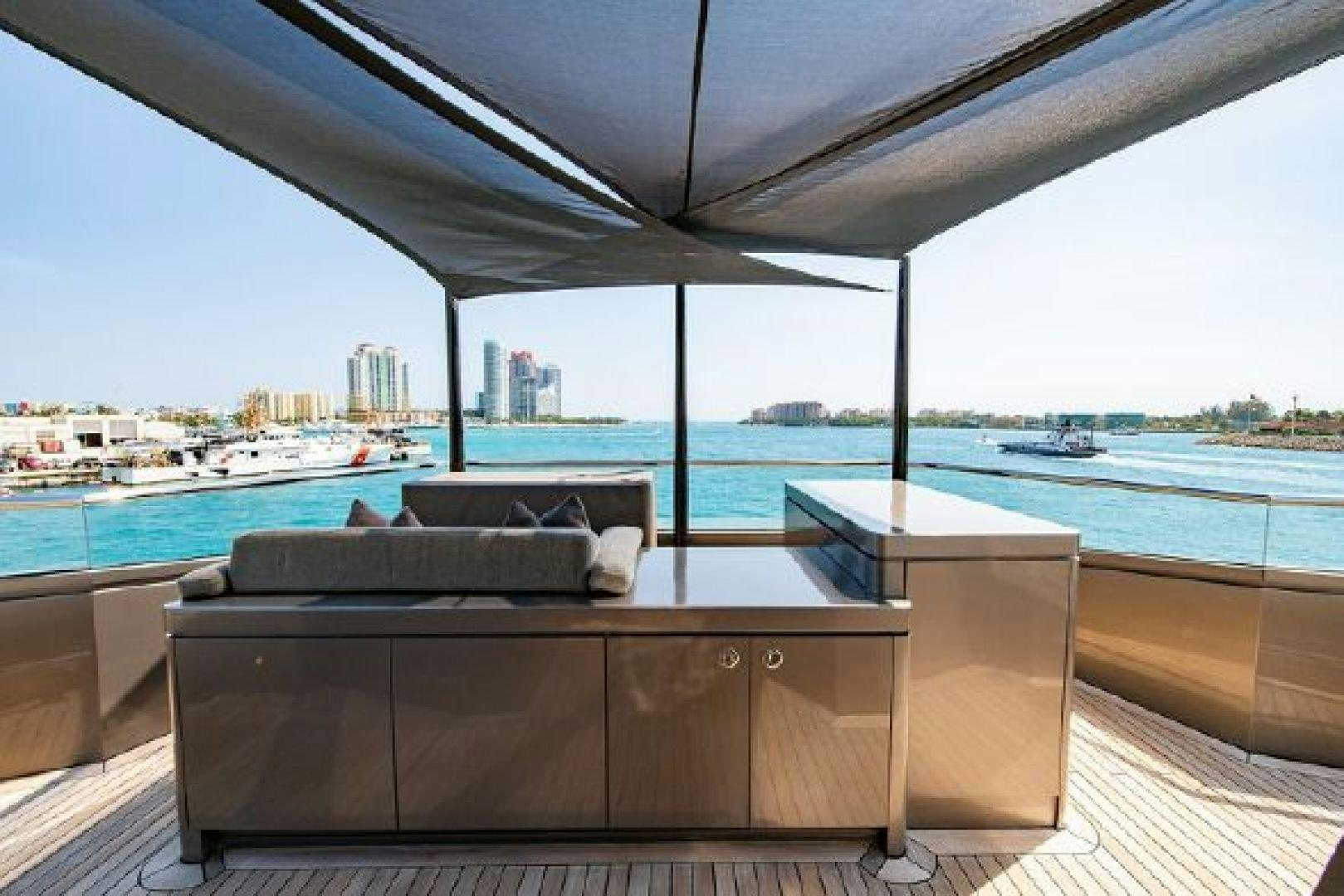 a room with a view of a city and a body of water aboard 174 OCEANFAST MIZU Yacht for Sale
