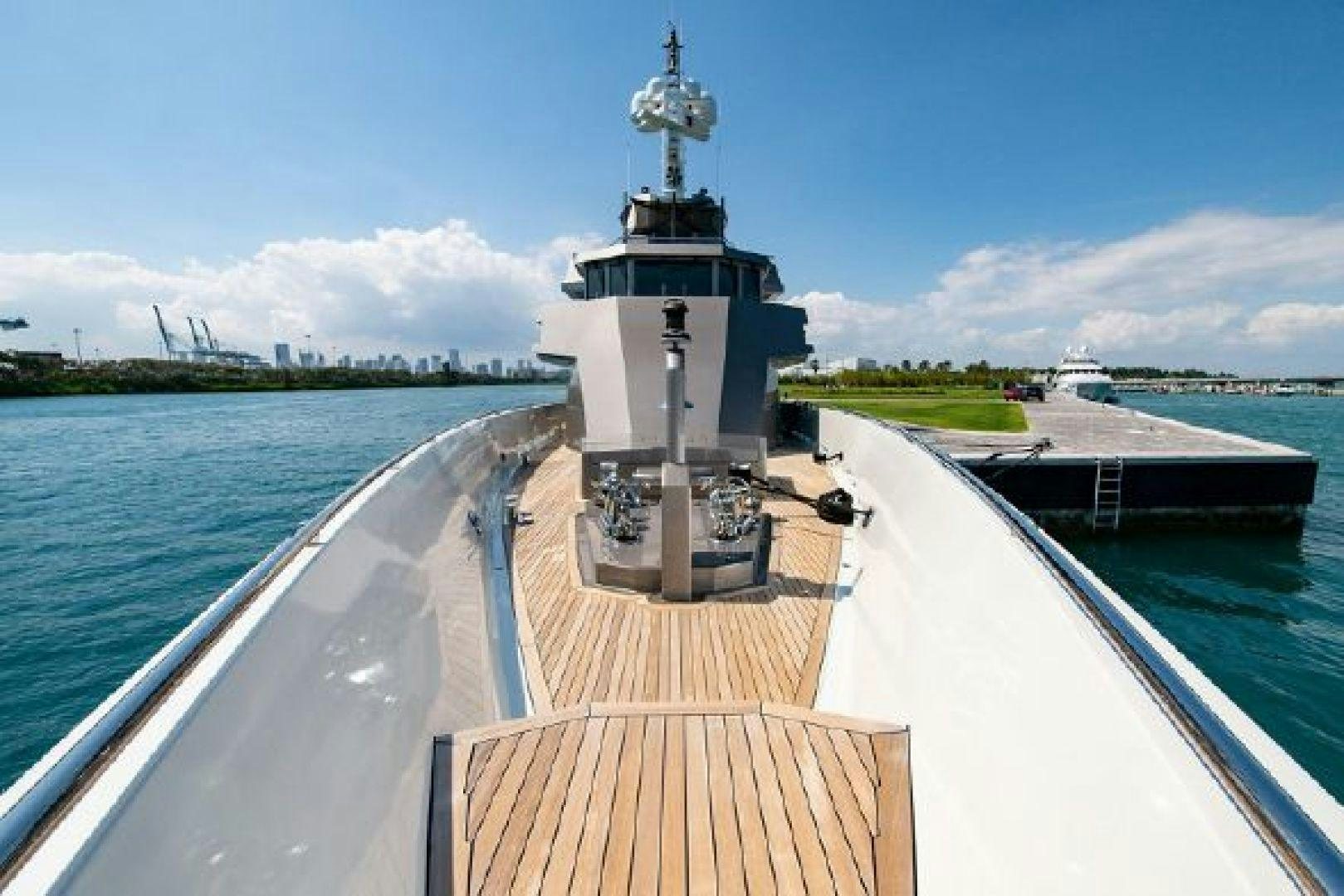a dock leading to a lighthouse aboard 174 OCEANFAST MIZU Yacht for Sale