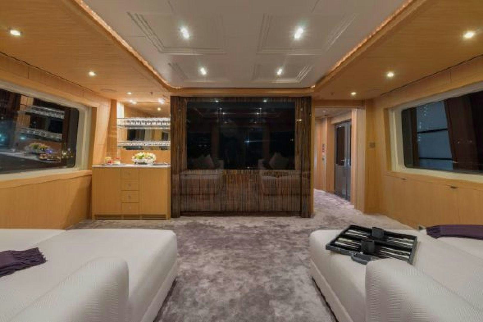 a bedroom with a large mirror aboard 174 OCEANFAST MIZU Yacht for Sale