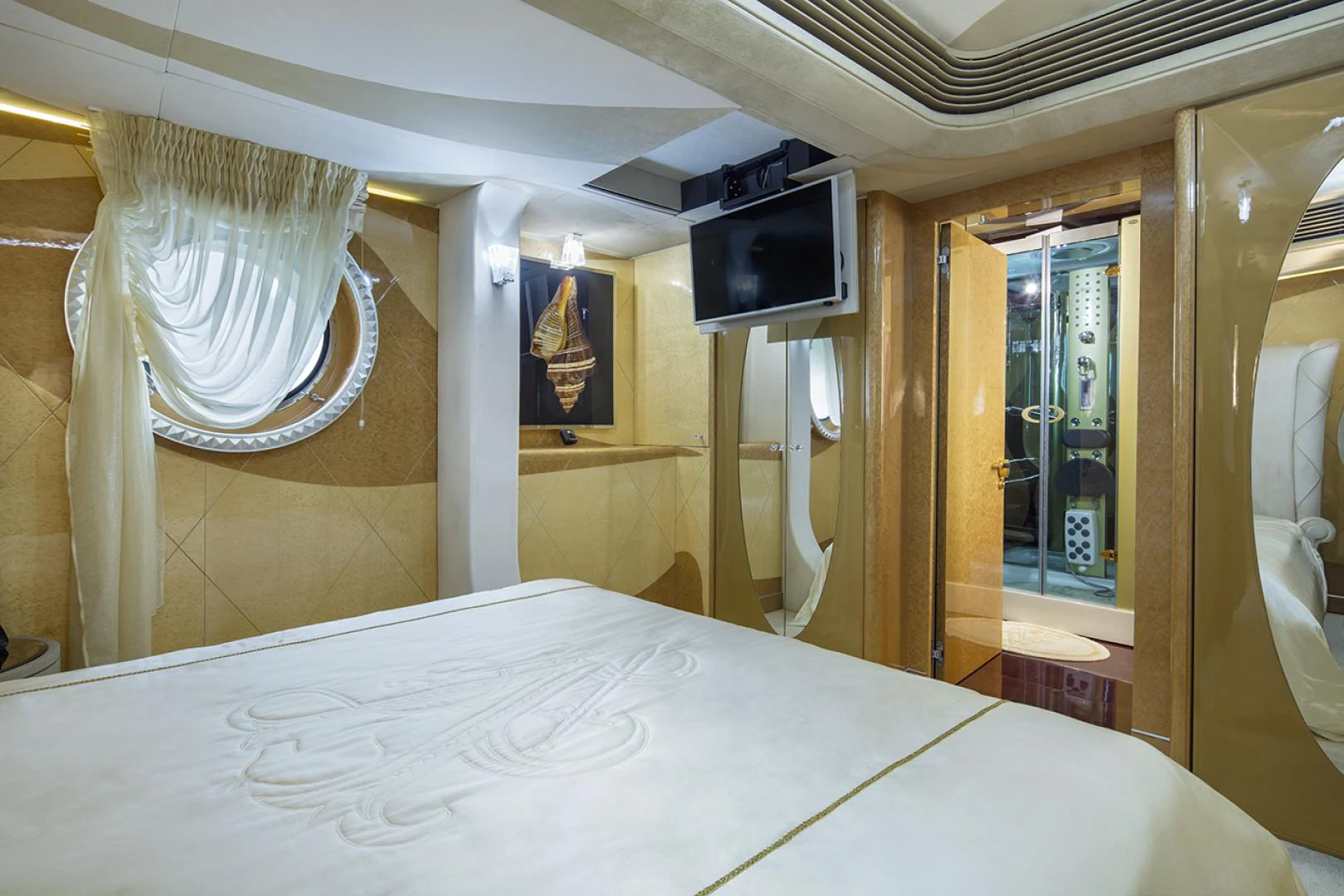 a bed with a white sheet aboard THUNDER Yacht for Sale