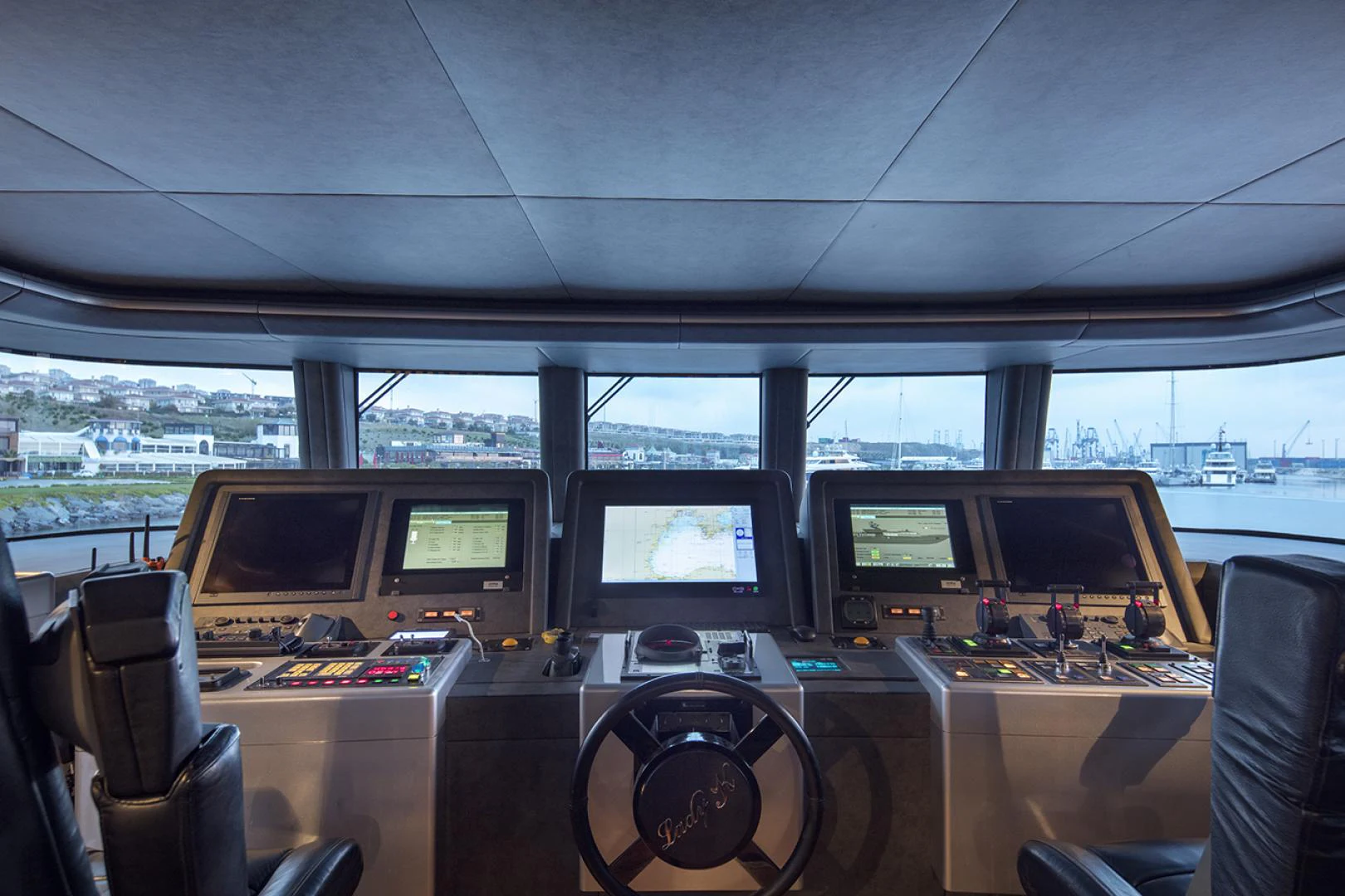 a room with computers and monitors aboard THUNDER Yacht for Sale