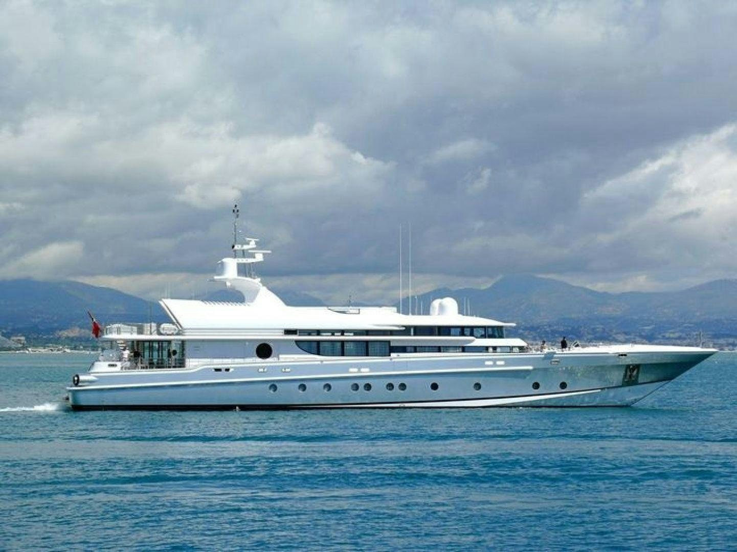 a white yacht in the water aboard THUNDER Yacht for Sale