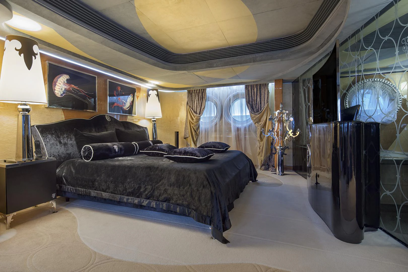 a large bedroom with a large bed aboard THUNDER Yacht for Sale