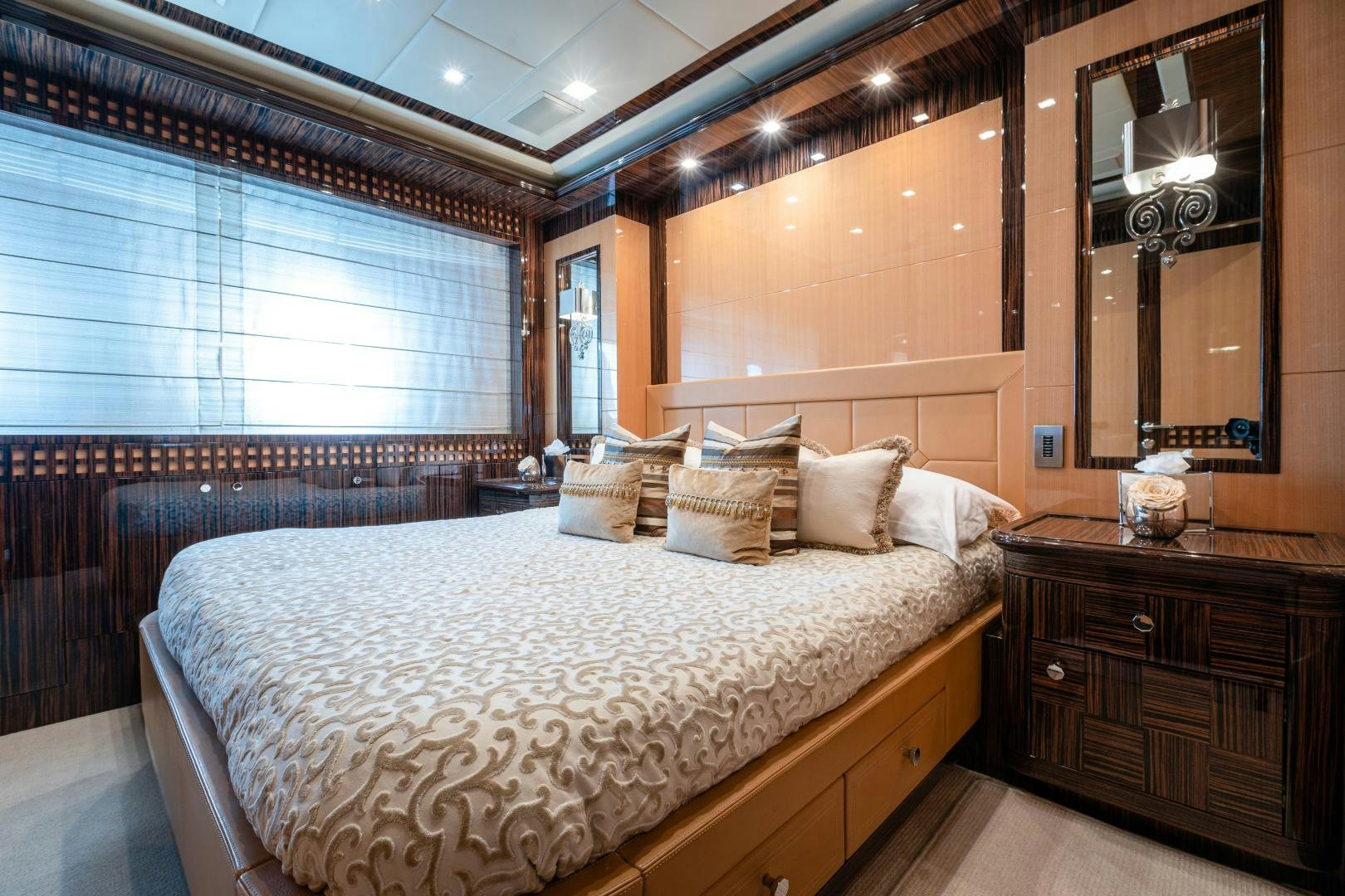 a large bed in a room aboard SERENITY Yacht for Sale