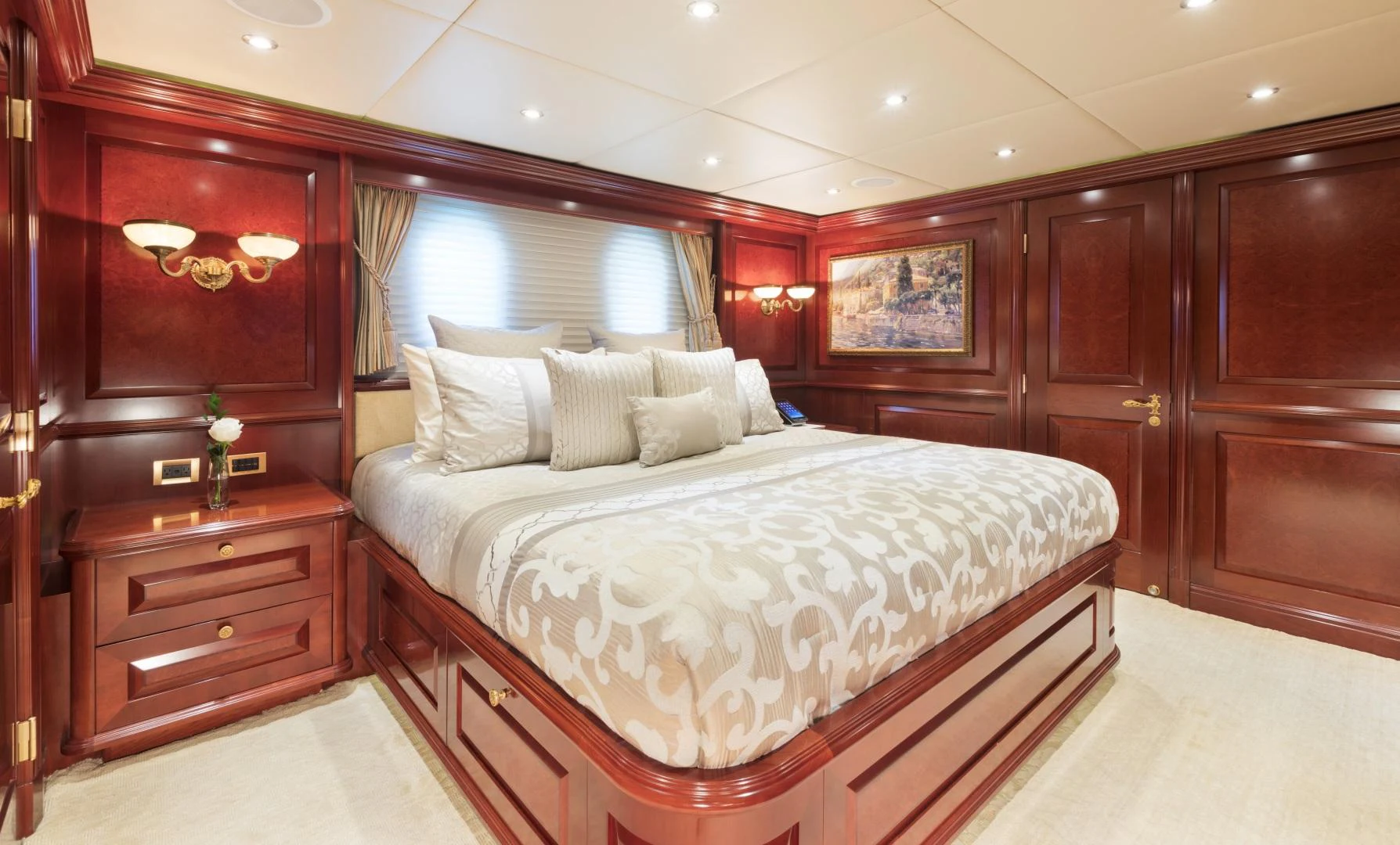 a large bed in a room aboard AMARULA SUN Yacht for Sale