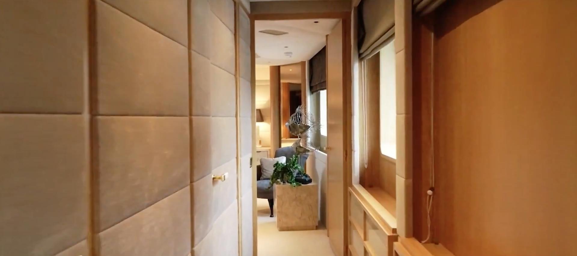 a room with a chair and a door aboard ANNA J Yacht for Sale