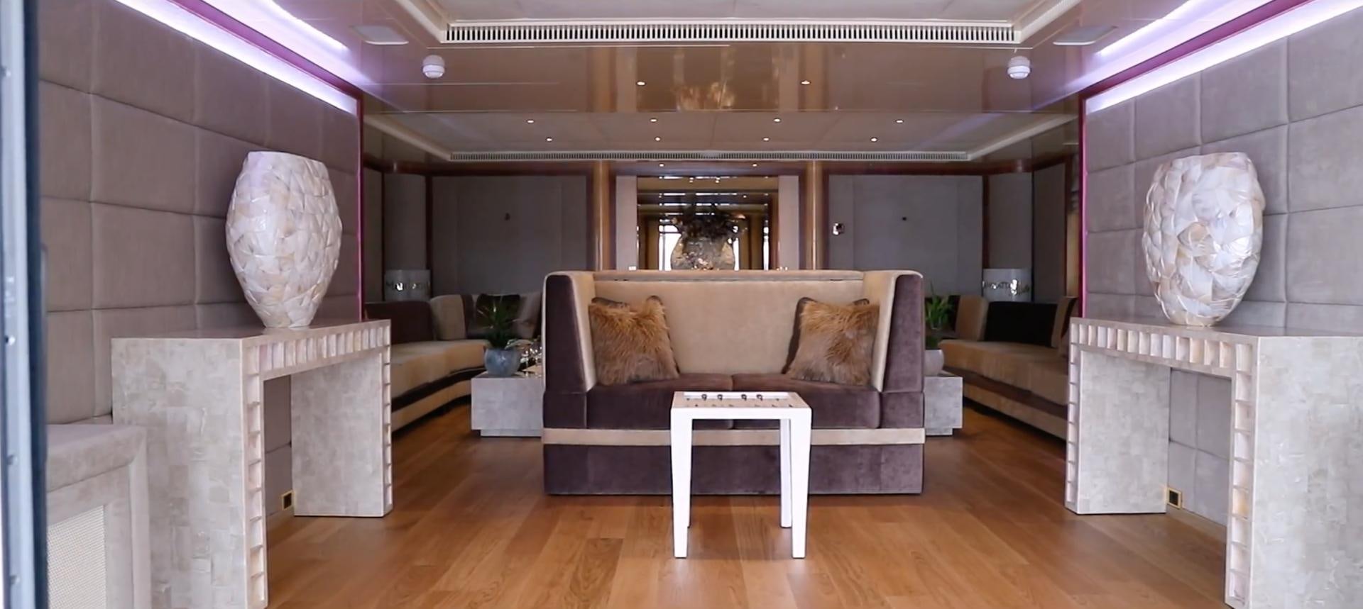 a room with a couch and a table aboard ANNA J Yacht for Sale