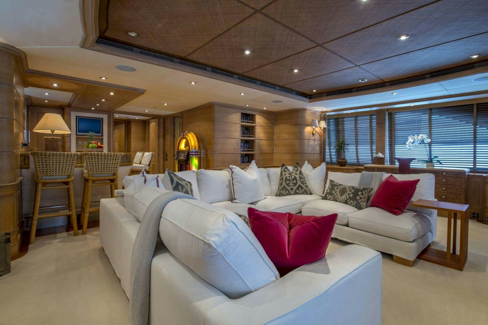 a living room with a large window aboard JO I Yacht for Sale