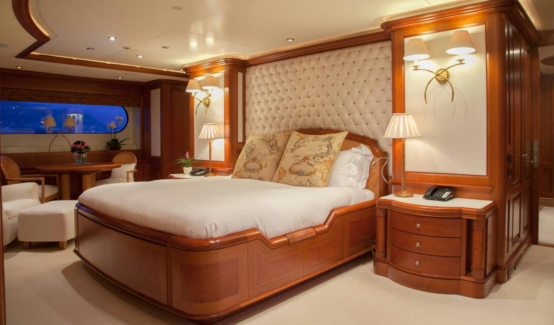a large bed in a hotel room aboard JO I Yacht for Sale